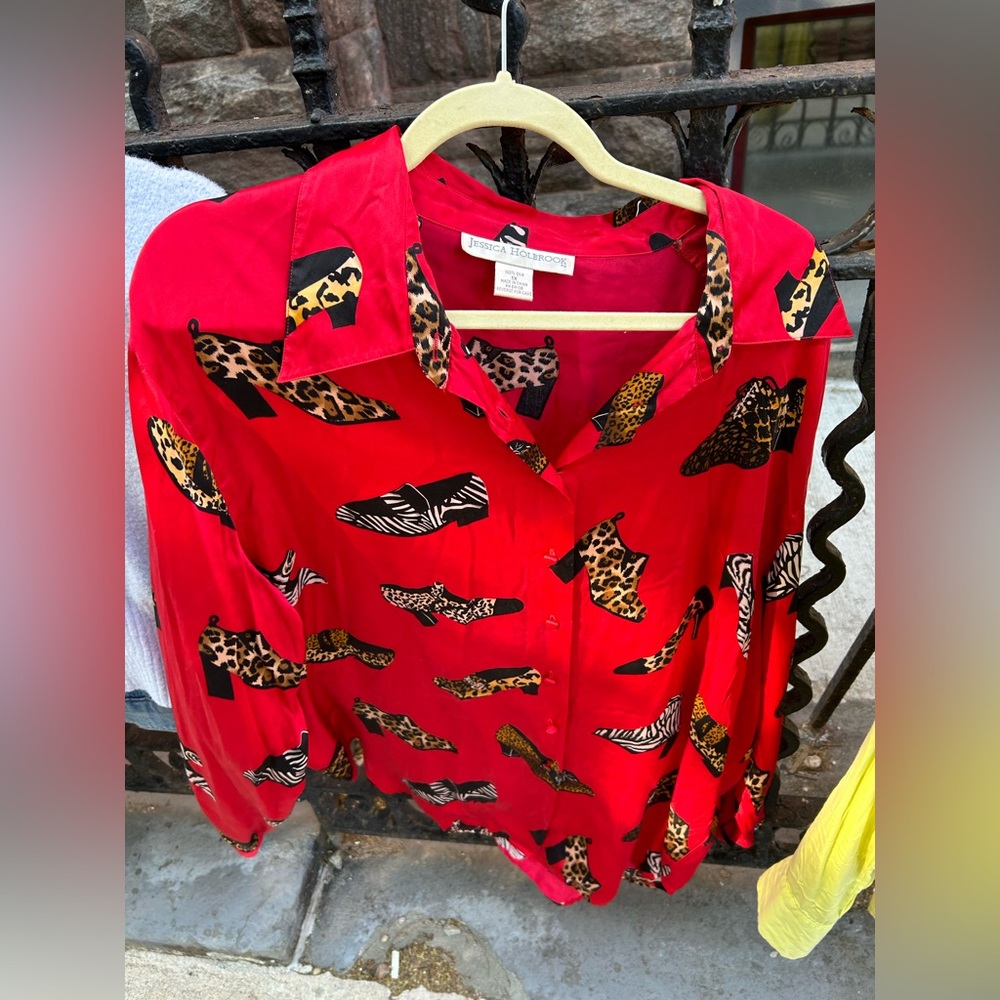 Red colorful dressy shirt with shoes decor
